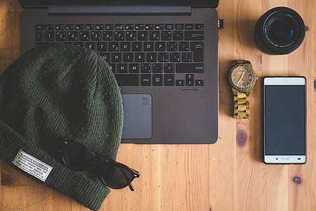 green knit cap on laptop computer thumbnail