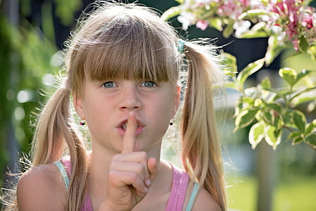 girl showing shuush sign thumbnail