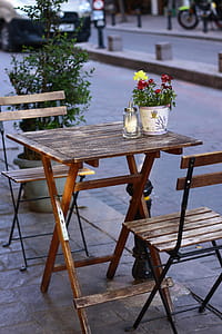 Shallow Focus Photography of Brown Wooden Folding Table With Chairs thumbnail