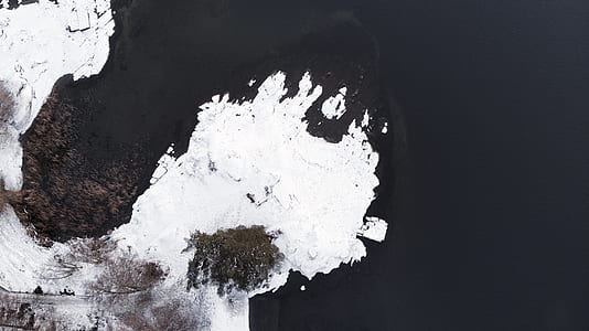 aerial view photography of snow field land thumbnail