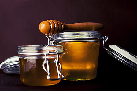 honey on clear glass canister thumbnail