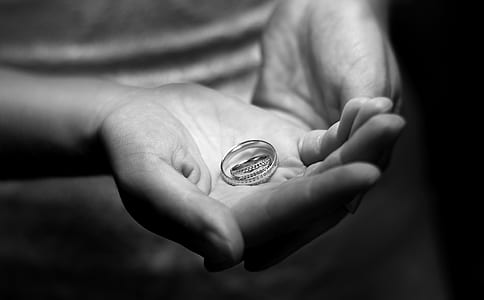 person holding ring thumbnail