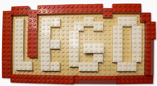 red, yellow, and white Lego plastic building blocks thumbnail