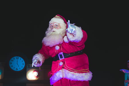 close-up photo of Santa Claus dancing thumbnail