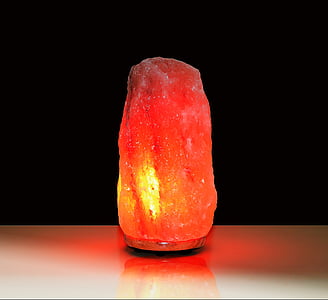 orange salt lamp on white surface thumbnail