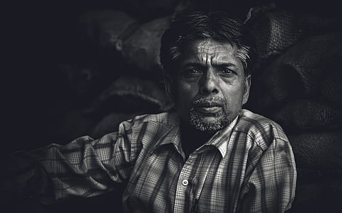 grayscale photo of man wearing plaid dress shirt thumbnail