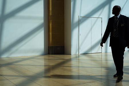 man walking on pathway thumbnail