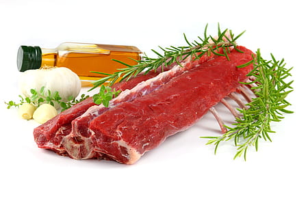 raw meat beside white garlic thumbnail
