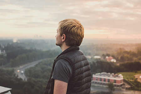 man standing outdoor during daytime thumbnail