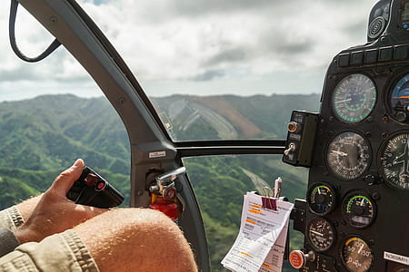 person driving helicopter thumbnail