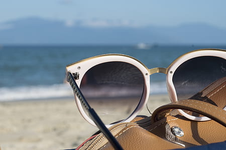 sunglasses on bag thumbnail