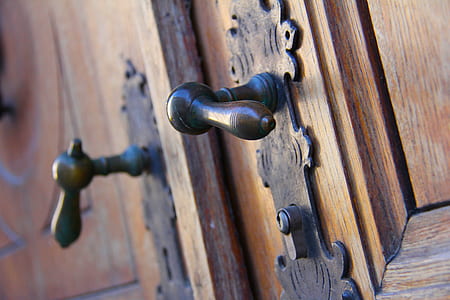 selective focus photography of lever door thumbnail