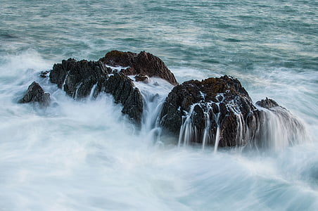 rock formation in body of water thumbnail