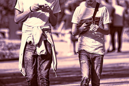 two person walking on walkway thumbnail