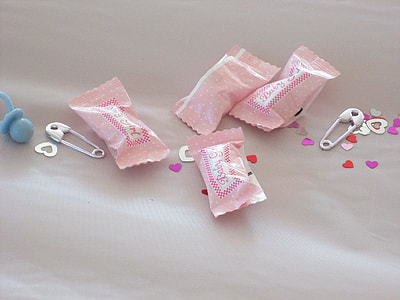 four pick candy packs near safety pins thumbnail