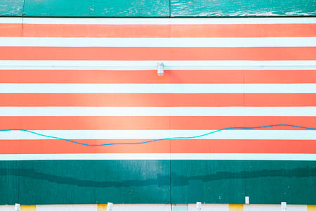 close-up photo of orange and white striped board thumbnail