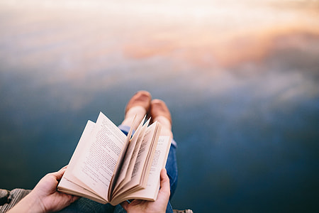 Reading book at lake thumbnail
