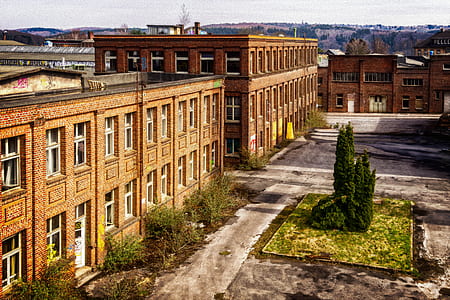 aerial photography of brown buildings thumbnail