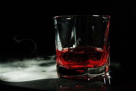 rocks glass filled with red liquid thumbnail