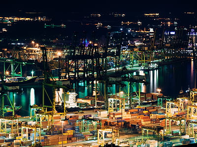 aerial view of cargo ship on dock thumbnail