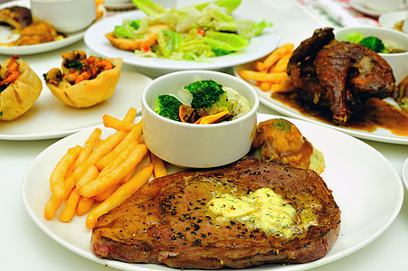 white ceramic plate with cooked meat thumbnail