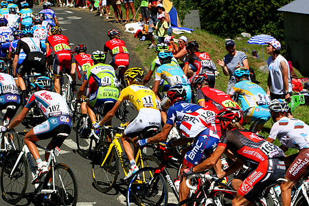 cyclists riding road bikes during daytime thumbnail