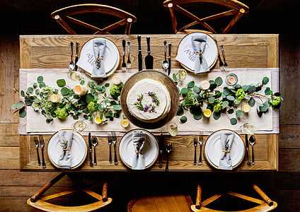 ceramic dinnerware on wooden dining table thumbnail