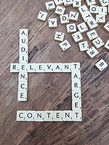 white-and-black scrabble set on top brown surface thumbnail