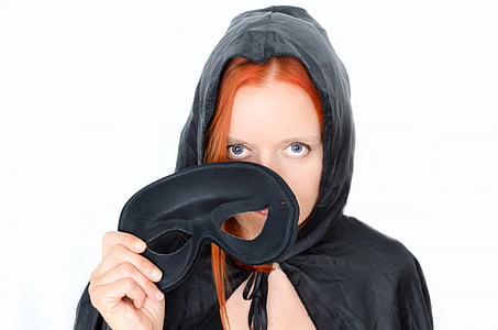 woman with red hair wearing black cowl thumbnail