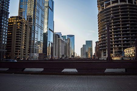 High Rise Buildings Under White Clouds and Blue Sky thumbnail