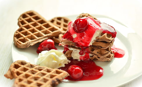 brown cookies filled white plate thumbnail