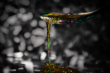 macro photography of liquid glittered thumbnail