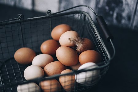 Metal wire basket with eggs thumbnail