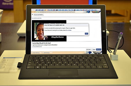 black computer laptop with turned-on screen thumbnail