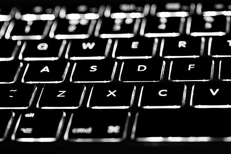 Macro shot of the backlit keyboard of a laptop, image captured with a Canon DSLR and 100m macro lens thumbnail