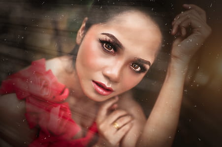woman in pink floral sleeveless dress thumbnail