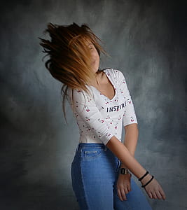 photo of woman standing covered face with hair thumbnail