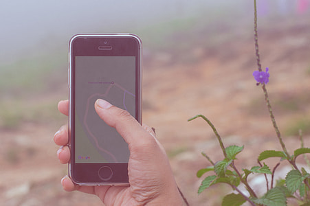 right human hand holding space gray iPhone 5s thumbnail