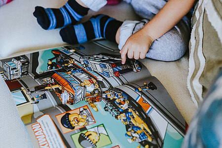 Child reading a comic story thumbnail