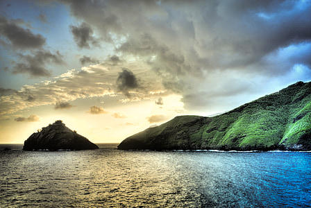 mountain near body of water thumbnail