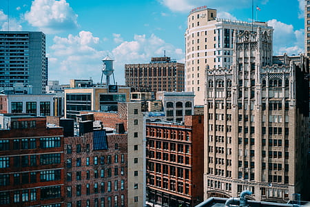 assorted-color high-rise buildings at daytime thumbnail