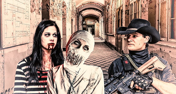 two zombies beside man holding rifle standing on hallway thumbnail