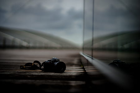 black DSLR camera thumbnail