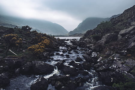running water under gray sky thumbnail