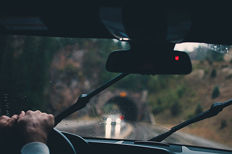 person driving on rainy weather thumbnail