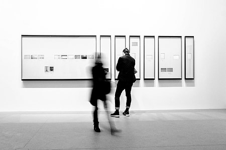 two person standing near wall thumbnail