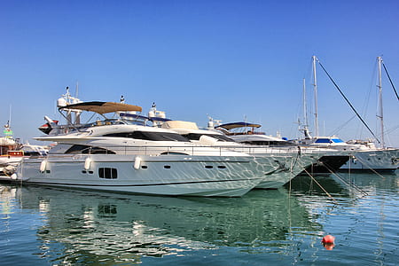 several yachts on body of water thumbnail