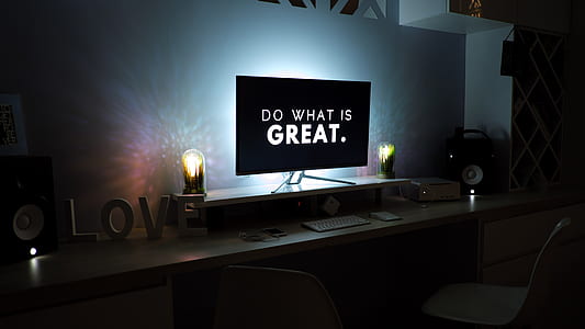 white flat screen TV and white wooden sideboard thumbnail