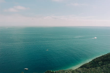aerial photograph of boat near sea thumbnail
