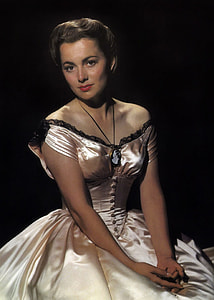 sitting woman wearing white and black off-shoulder corset gown thumbnail